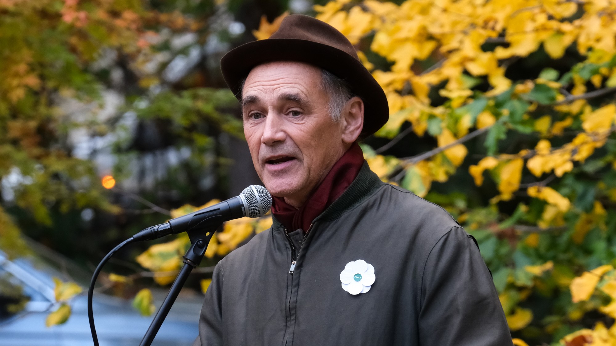 The actor Mark Rylance wearing a white poppy at the Alternative Remembrance Ceremony by the Peace Pledge Union in Tavistock Square.