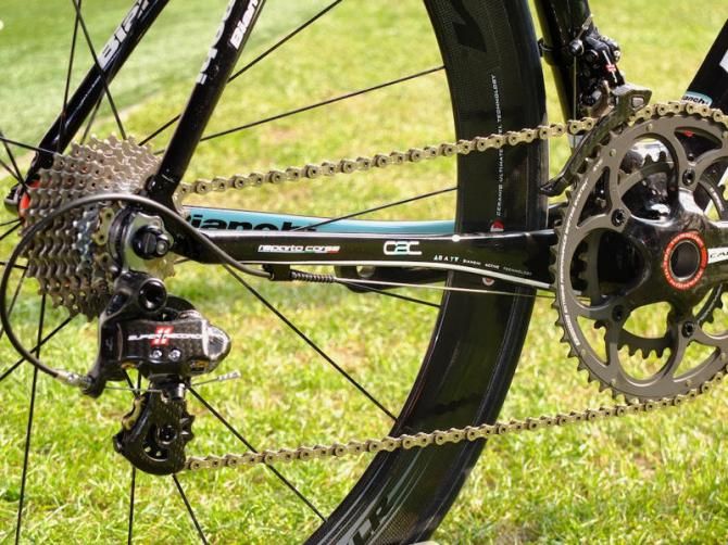 The chain stays are flattened horizontally but laterally rigid