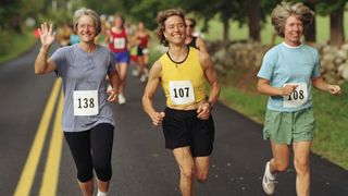 Three people running a marathon