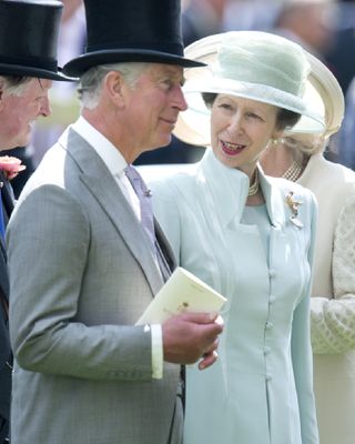 King Charles and Princess Anne share a happy moment at Royal Ascot