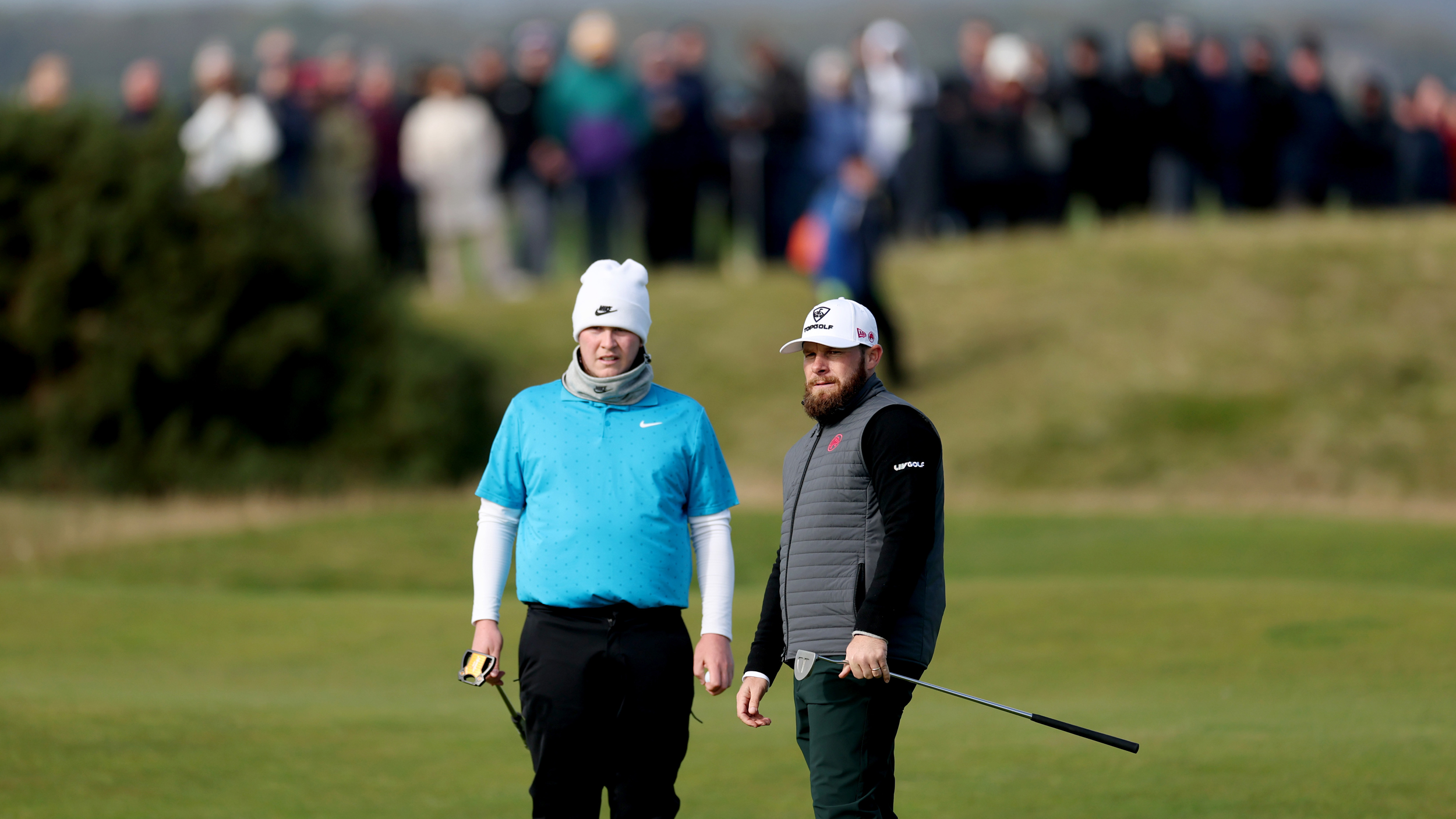 Robert MacIntyre and Tyrrell Hatton look on during the final round of the 2025 Alfred Dunhill Links Championship at St Andrews&#039; Old Course
