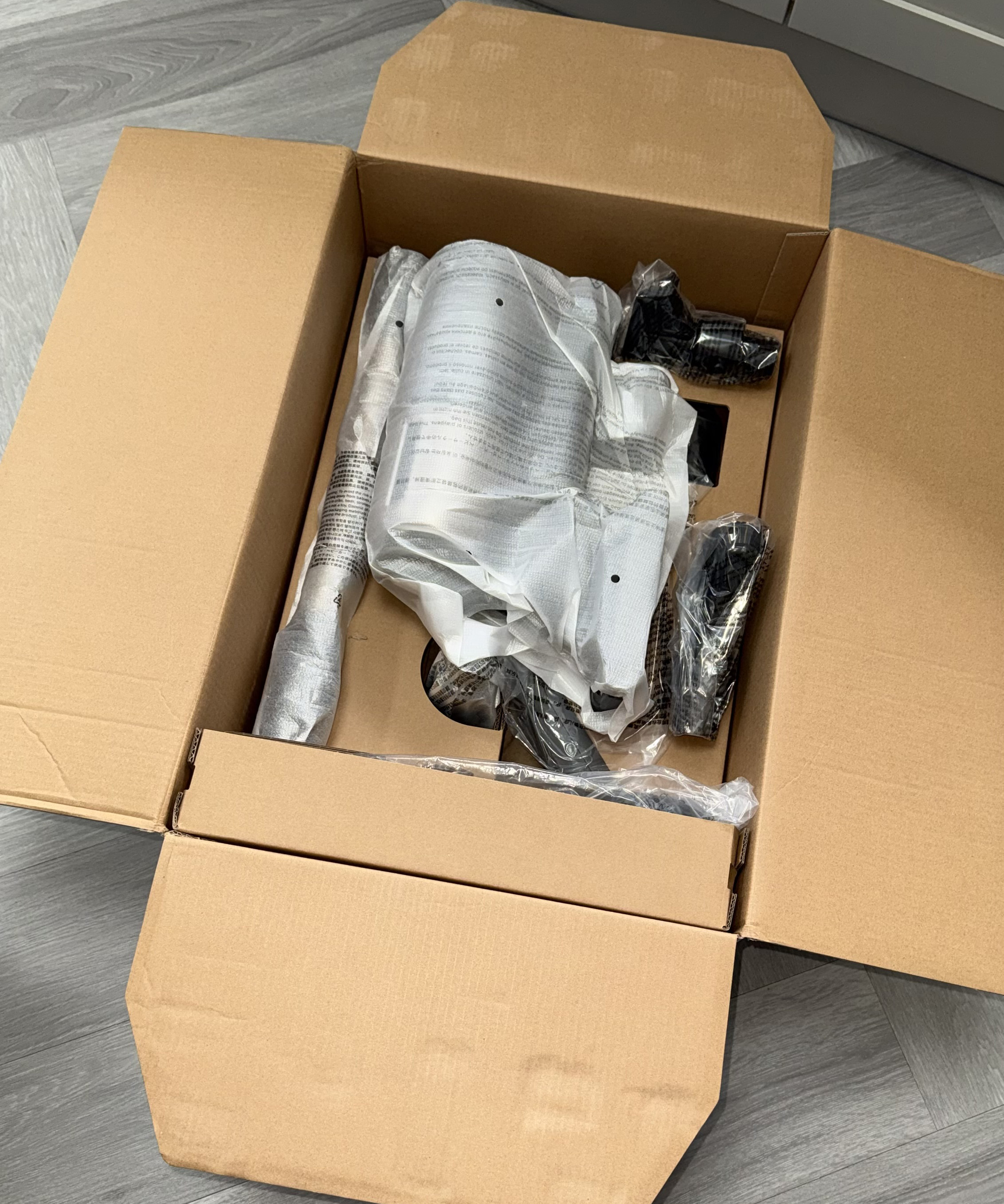 The Dreame Z30 Pro Aqua packaging with parts still inside the box