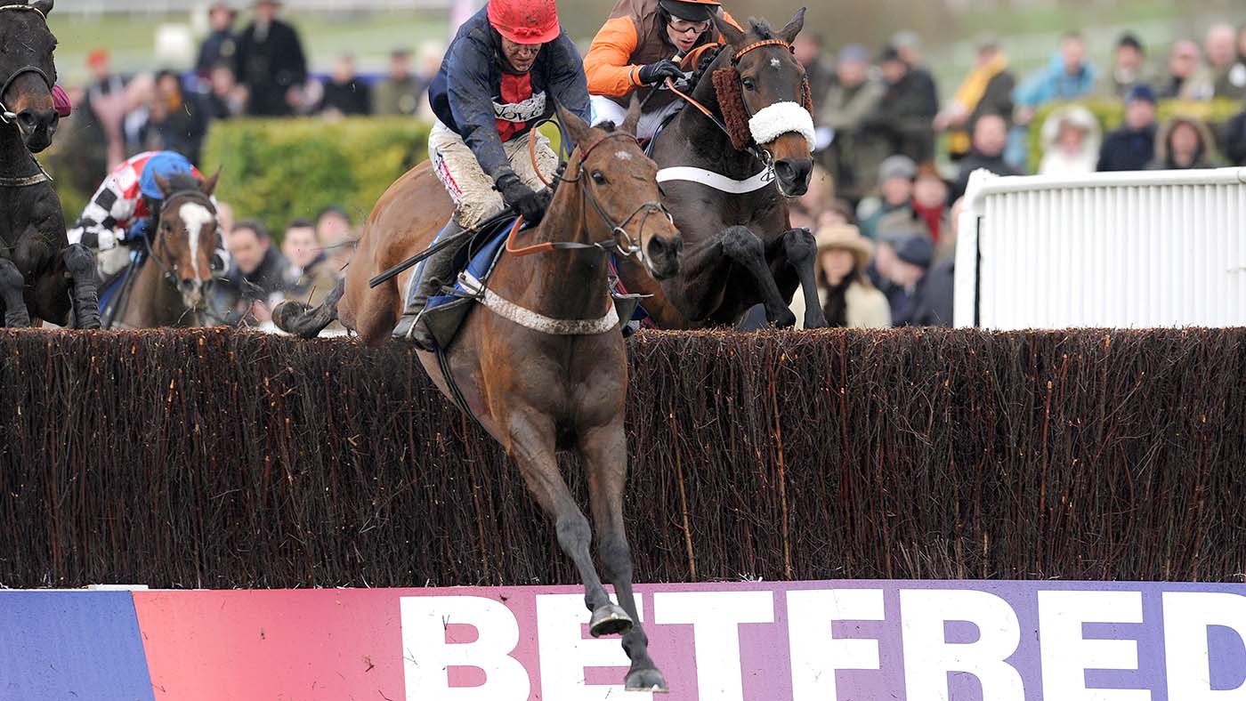 *ALTERNATE CROP* Bobs Worth ridden by Barry Geraghty (left) goes on to win ahead of Long Run ridden by Sam Waley-Cohen in the Betfred Cheltenham Gold Cup Steeple Chase during the Cheltenham Gold Cup Day on Day Four of the 2013 Cheltenham Festival at Cheltenham Racecourse, Gloucestershire. Horse Racing - 2013 Cheltenham Festival - Day Four - Cheltenham Racecourse