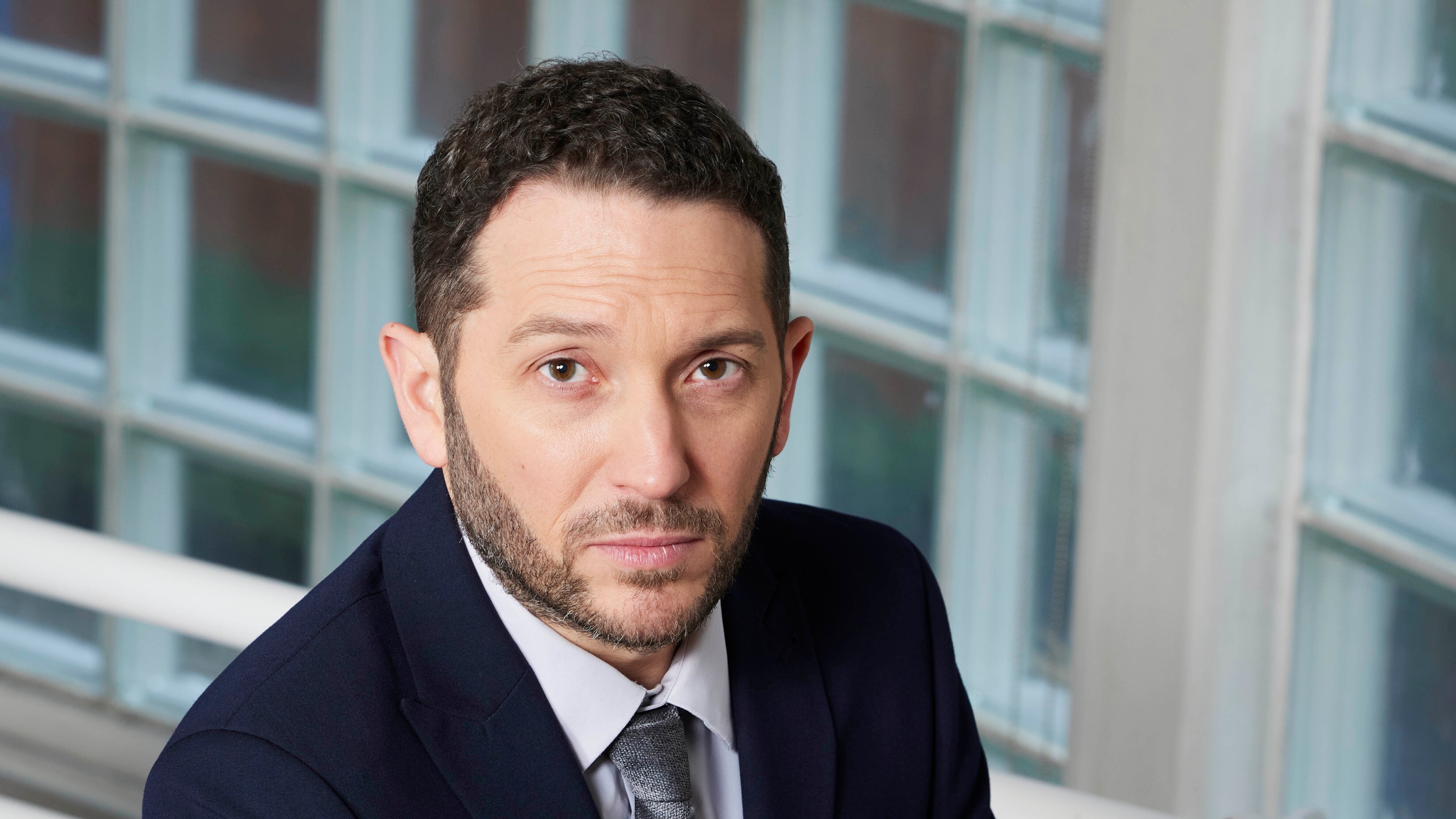 Jon Richardson as Waterloo Road media studies teacher Darius Donovan.