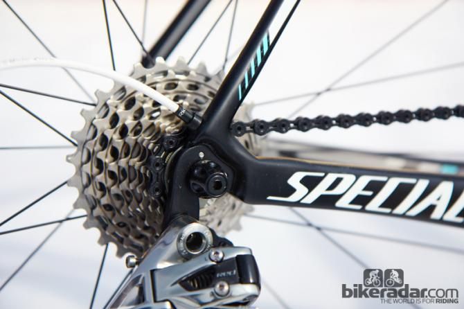 The rear derailleur cable is routed through the chain stay and hollow carbon fiber dropout. Interchangeable inserts make them compatible with both mechanical and electronic drivetrains.