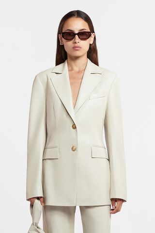 Nanushka Hathi Okobor Alt-Leather Blazer in Creme