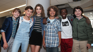 Noah Schnapp, Millie Bobby Brown, Natalia Dyer, Gaten Matarazzo, Caleb McLaughlin, and Finn Wolfhard attend a 2016 Build series discussion for Stranger Things 