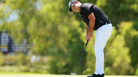 Patrick Reed putts during the 2022 Mexico Open