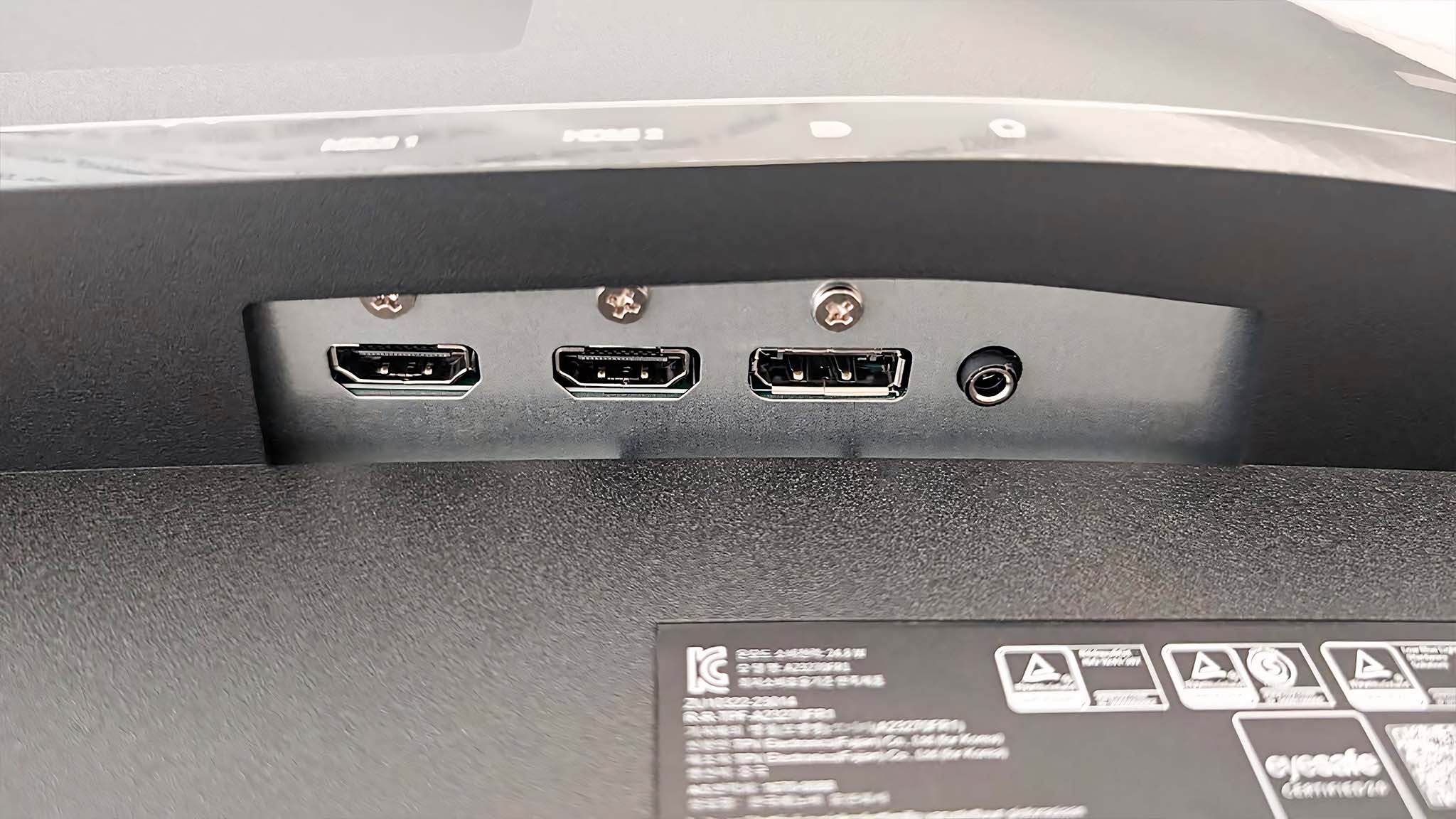 Closeup of Lenovo Legion R27fc-30 two HDMI ports, DisplayPort, and audio jack. 