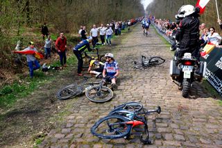 A crash early in the Arenberg forest took down Kasper Asgreen in the 2023 Paris-Roubaix