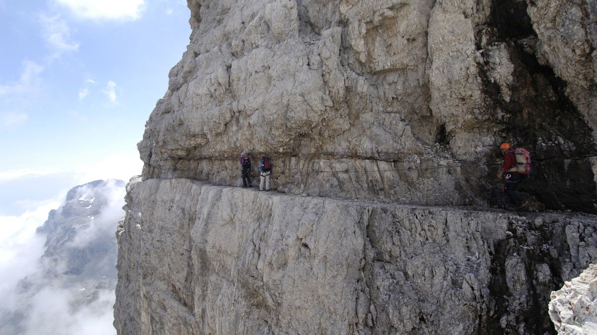 Climbers on a via ferrata route