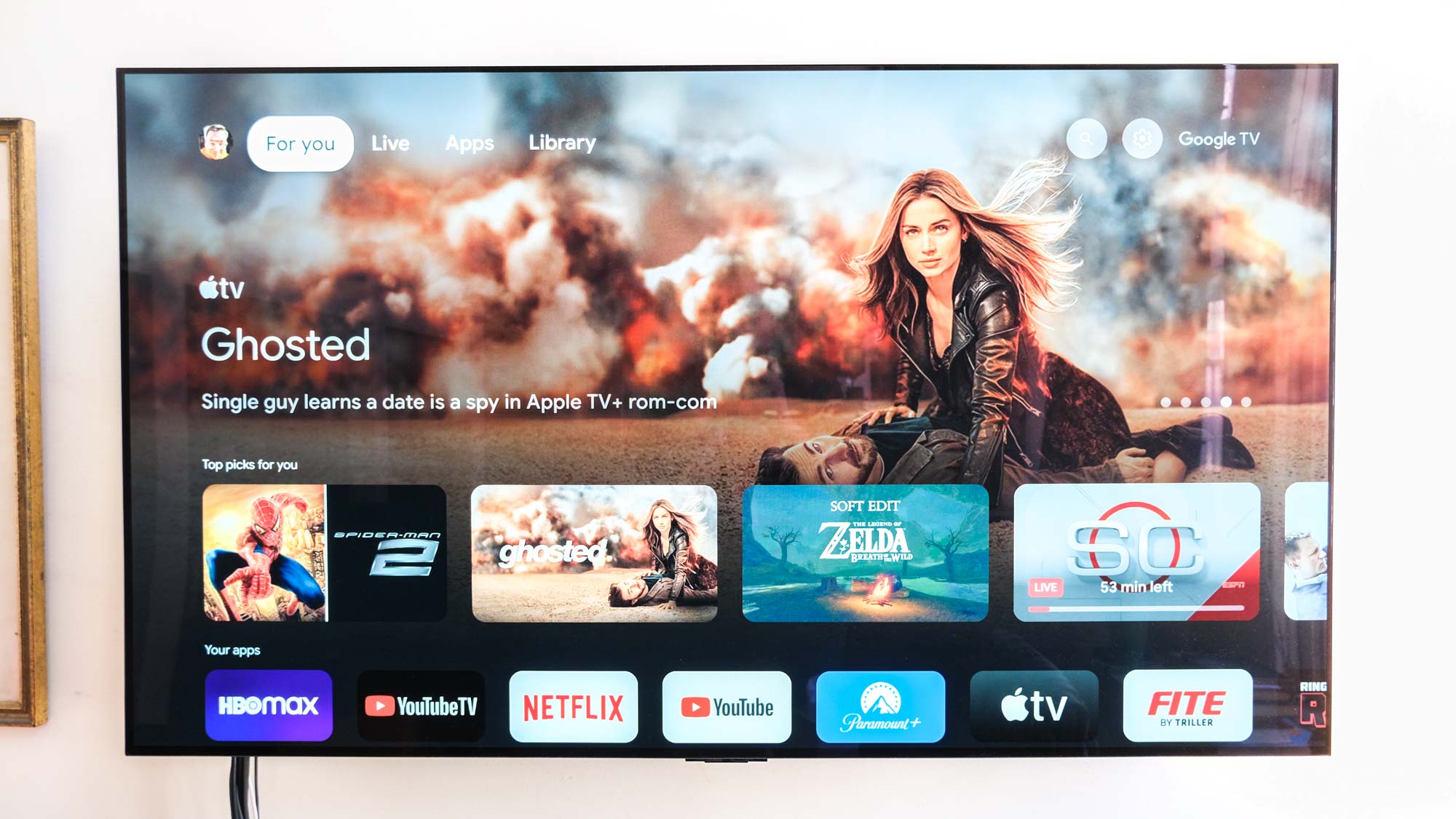 The Chromecast home screen with Google TV with an advertisement for Apple TV Plus' Ghosted