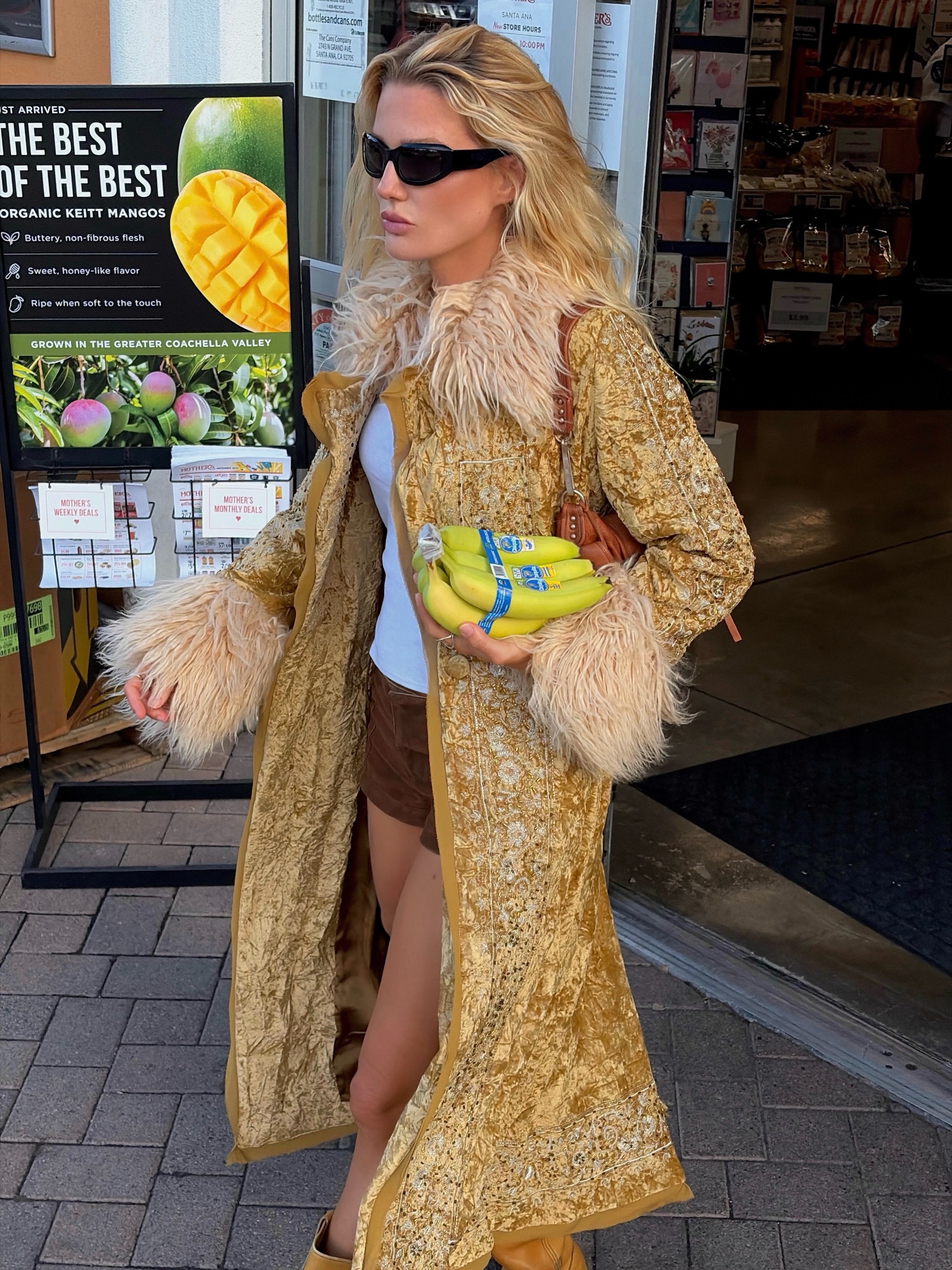 Woman in a gold coat