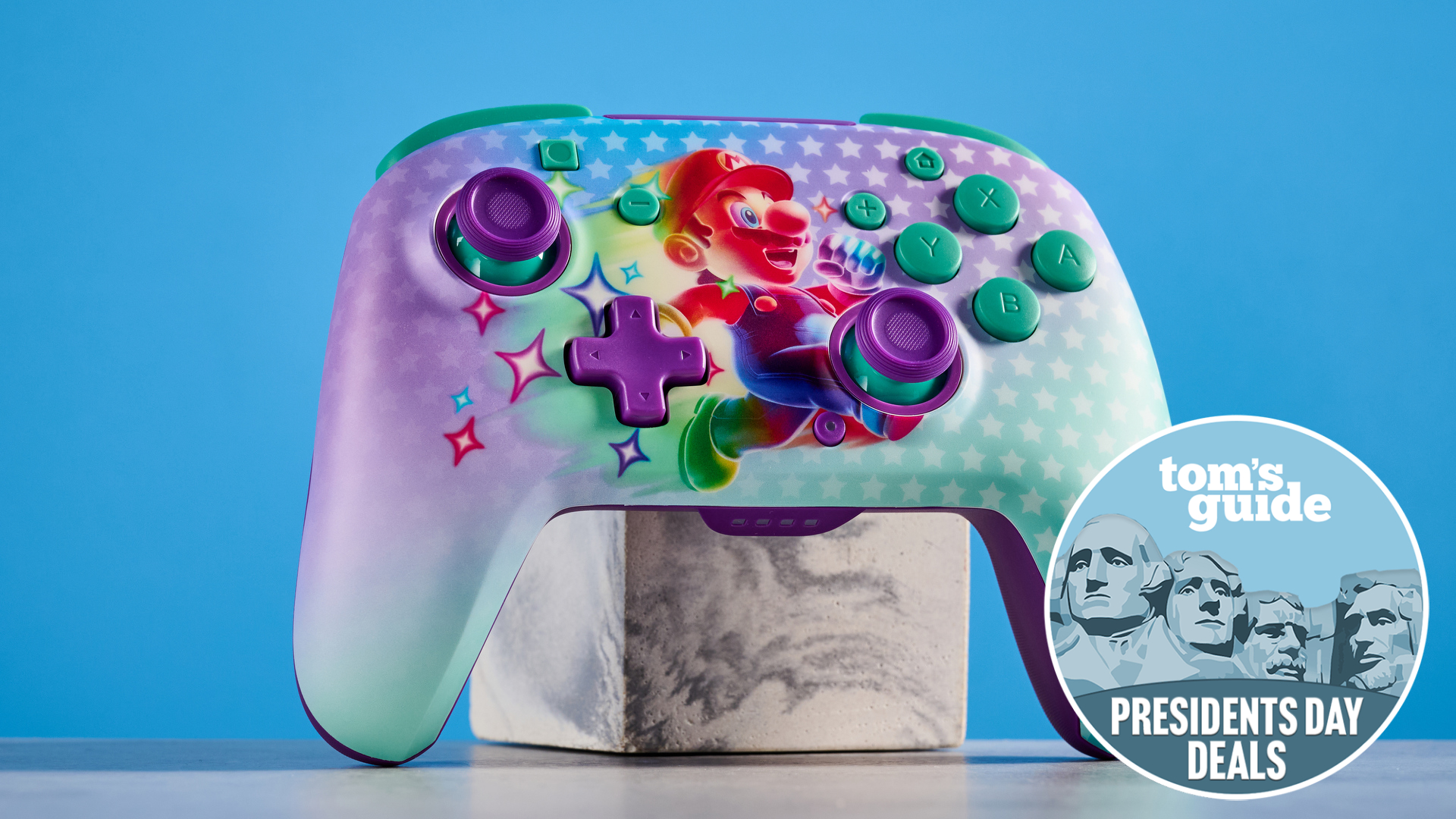 The Turtle Beach Rematch Wireless Switch controller (with Rainbow Mario finish) on a stand, with Tom's Guide's Presidents' Day Deals badge in the bottom-right corner