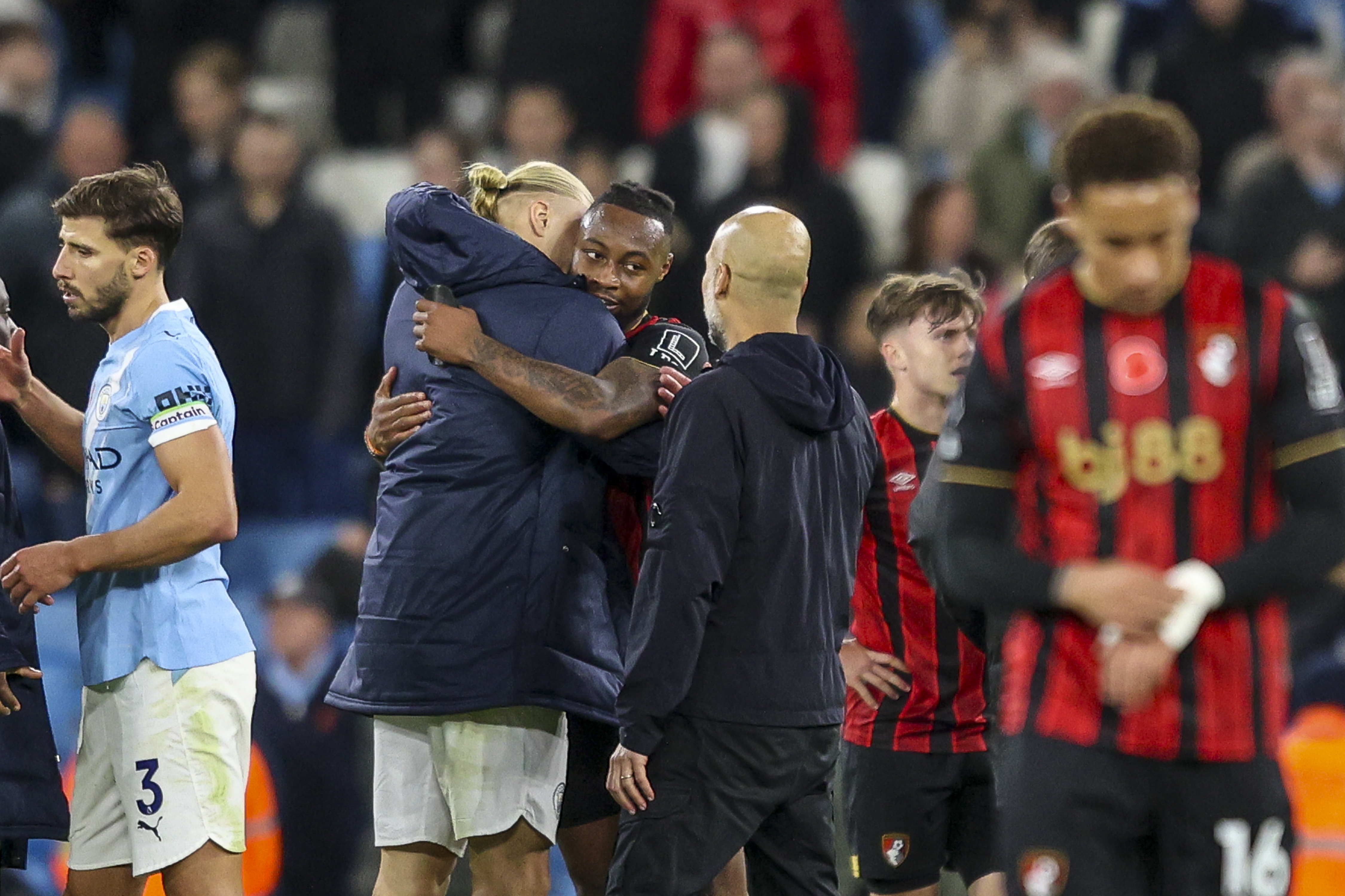 MANCHESTER, ENGLAND - NOVEMBER 02: Antoine Semenyo of Bournemouth after his sides 3-1 defeat with Erling H&amp;aring;land and Head Coach Pep Guardiola of Manchester City during the Premier League match between Manchester City and Bournemouth at Etihad Stadium on November 02, 2025 in Manchester, England. (Photo by Robin Jones - AFC Bournemouth/AFC Bournemouth via Getty Images)