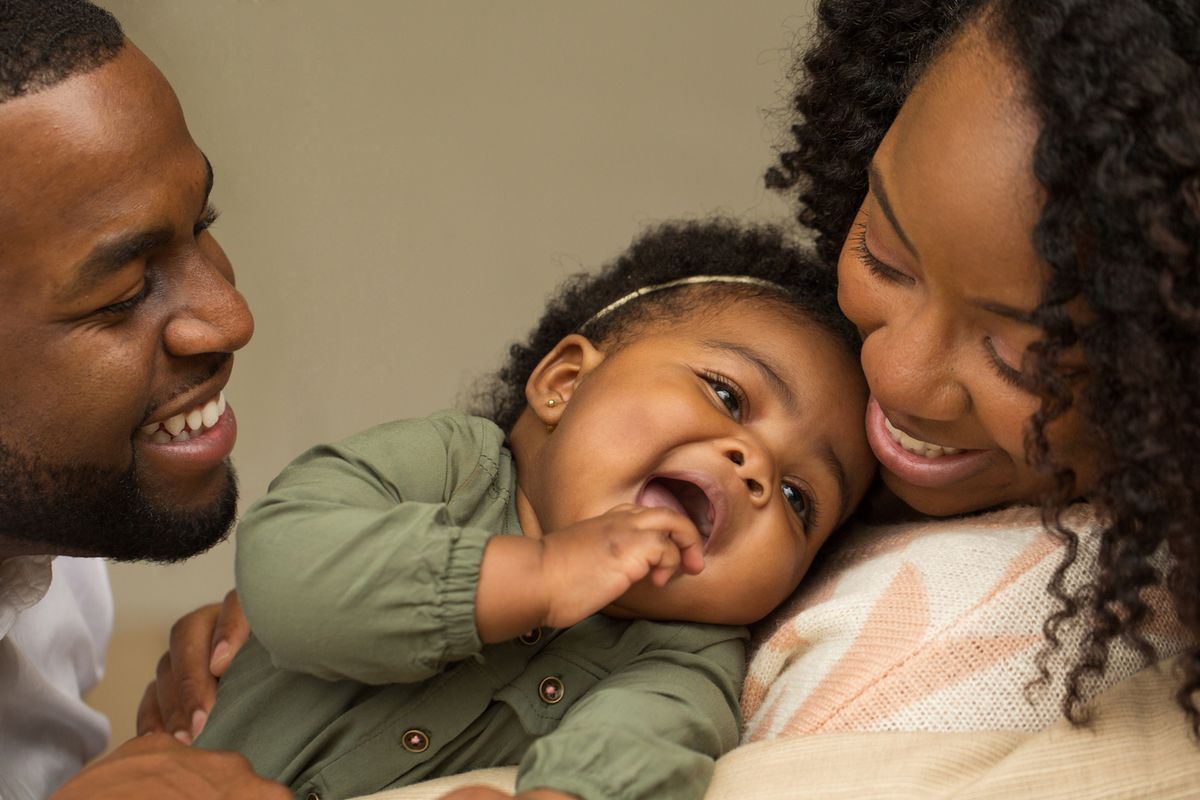 Baby girl with parents