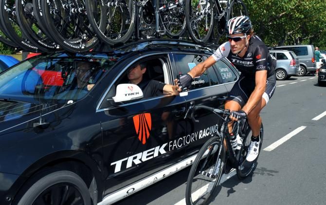 Fabian Cancellara (Trek) drops back to the team car for a bidon