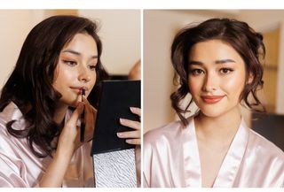 Liza Soberano applying lipstick and posing for the camera in a pink robe.