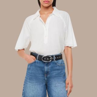 Flat lay image of woman wearing white shirt and denim jeans 