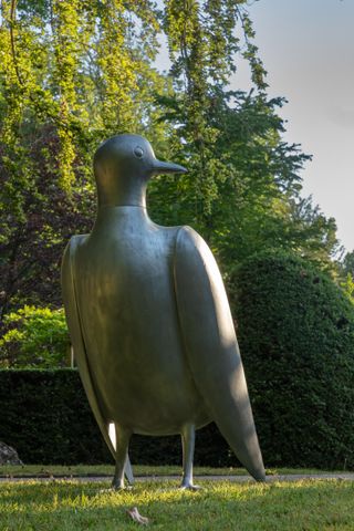 Dove sculpture/chair, part of Les Lalanne Sotheby's sale, seen in garden
