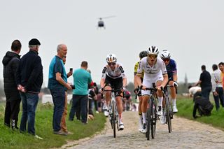 ROUBAIX FRANCE APRIL 06 LR Pfeiffer Georgi of The United Kingdom and Team dsmfirmenich PostNL Lotte Kopecky of Belgium and Team SD Worx Protime Marthe Truyen of Belgium and Team FenixDeceuninck compete in the breakaway passing through the Mons en Pevele cobblestones sector during the 4th ParisRoubaix Femmes 2024 a 1485km one day race from Denain to Roubaix on UCIWWT April 06 2024 in Roubaix France Photo by Luc ClaessenGetty Images