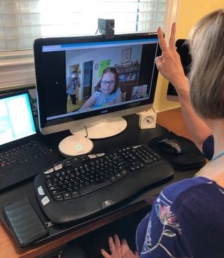 Lynn Carswell, a speech language pathologist and owner of Right Fit Speech and Feeding Therapy, is seeing patients with the help of pro AV technology. 