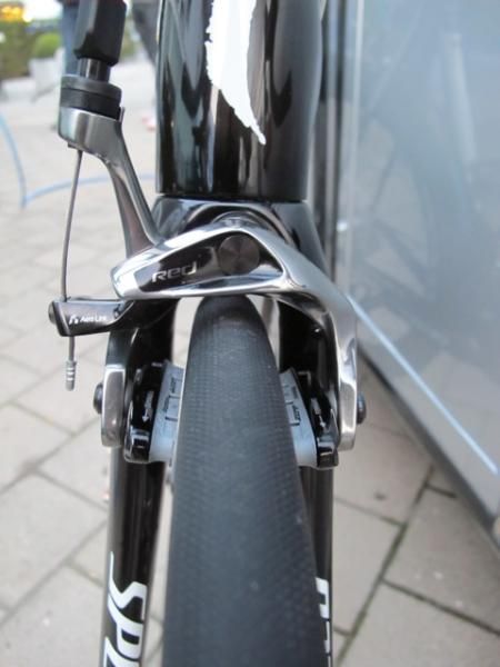 SRAM's new Red 2012 brake calipers use a cam-actuated single-pivot layout.