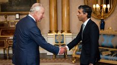 Rishi Sunak shaking hands with King Charles III