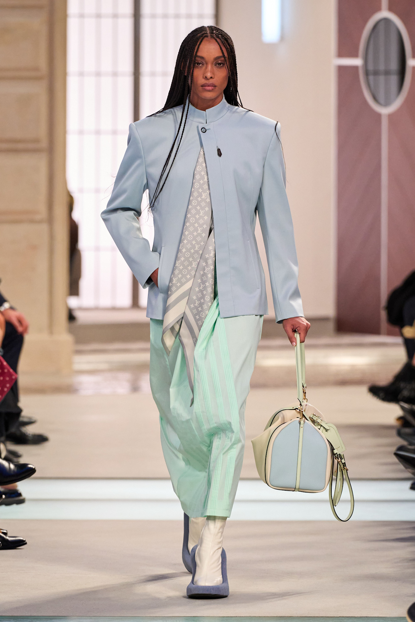 Model wears the baby blue color trend on the runway.
