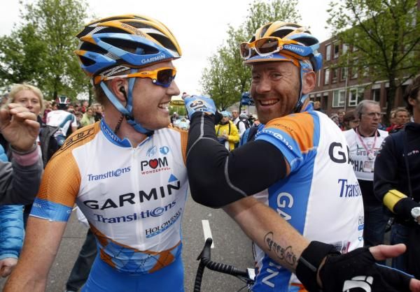 Garmin-Transitions teammates Tyler Farrar and Svein Tuft celebrate together after the stage
