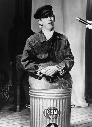 Charles, Prince of Wales rehearsing his part in a sketch called 'Scoop' for the Trinity College Dryden Society revue called 'Revolution', at Cambridge.