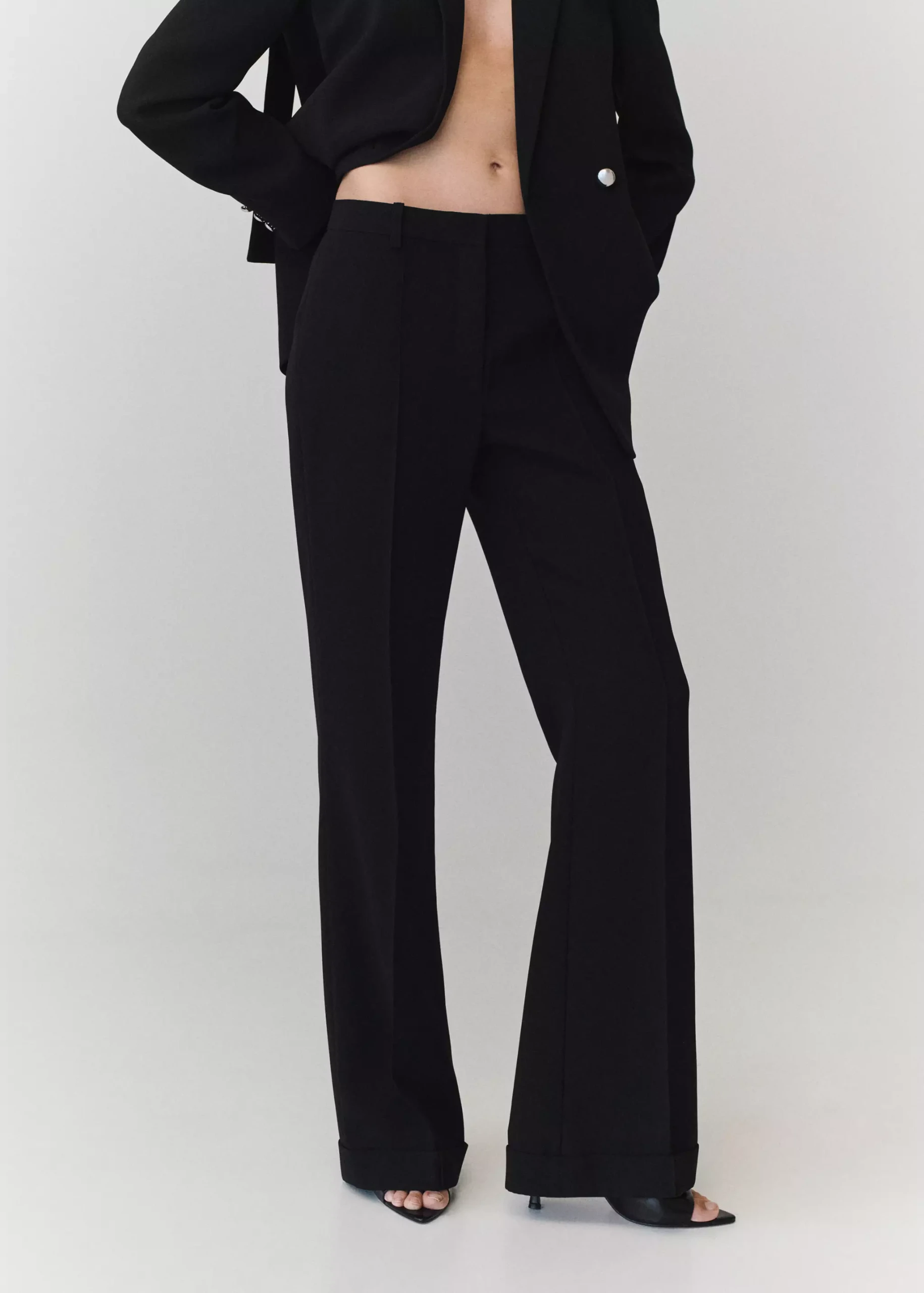 Flared Trousers With Seams - Women | Mango United Kingdom