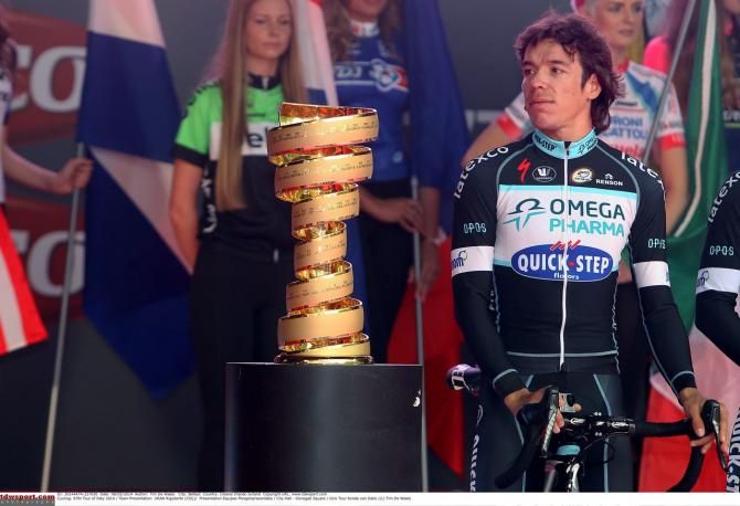 Rigoberto Uran (Omega Pharma-QuickStep) next to the Giro d'Italia winner's trophy