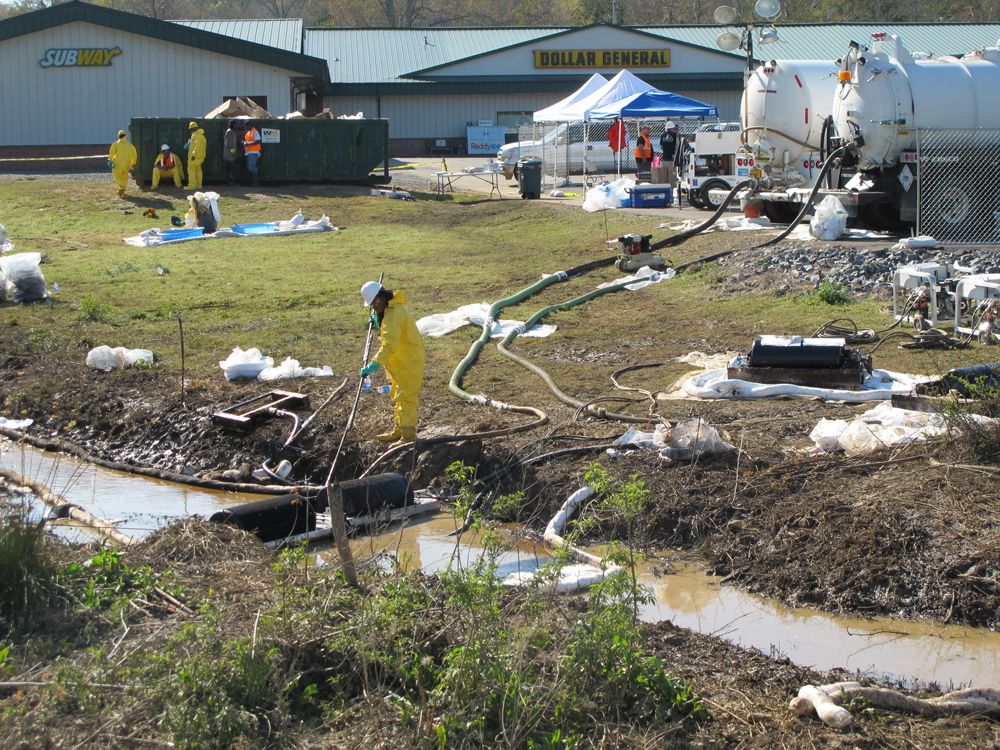 Cleanup operations in a shopping center in Mayflower, Ark.