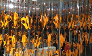 Orange-handled scissors