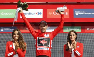 Tom Dumoulin shows off his red jersey