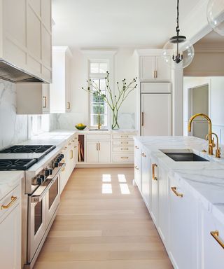 Neutral kitchen by Alison Babcock painted in Swiss Coffee by Benjamin Moore