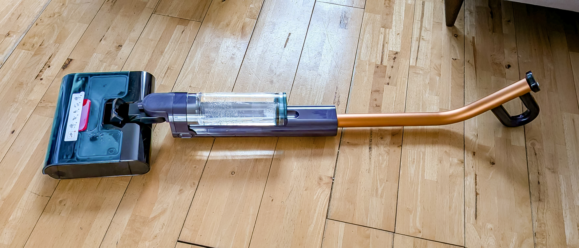 Dyson Clean + Wash Hygiene lying on hard wood floor