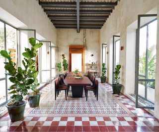 Mexican style dining room with red and white tiles