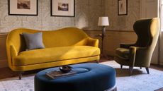 Love Your Home x Turner's House collection, including an antique-inspired sofa, footstool, and armchair pictured inside of a characterful English countryside living room