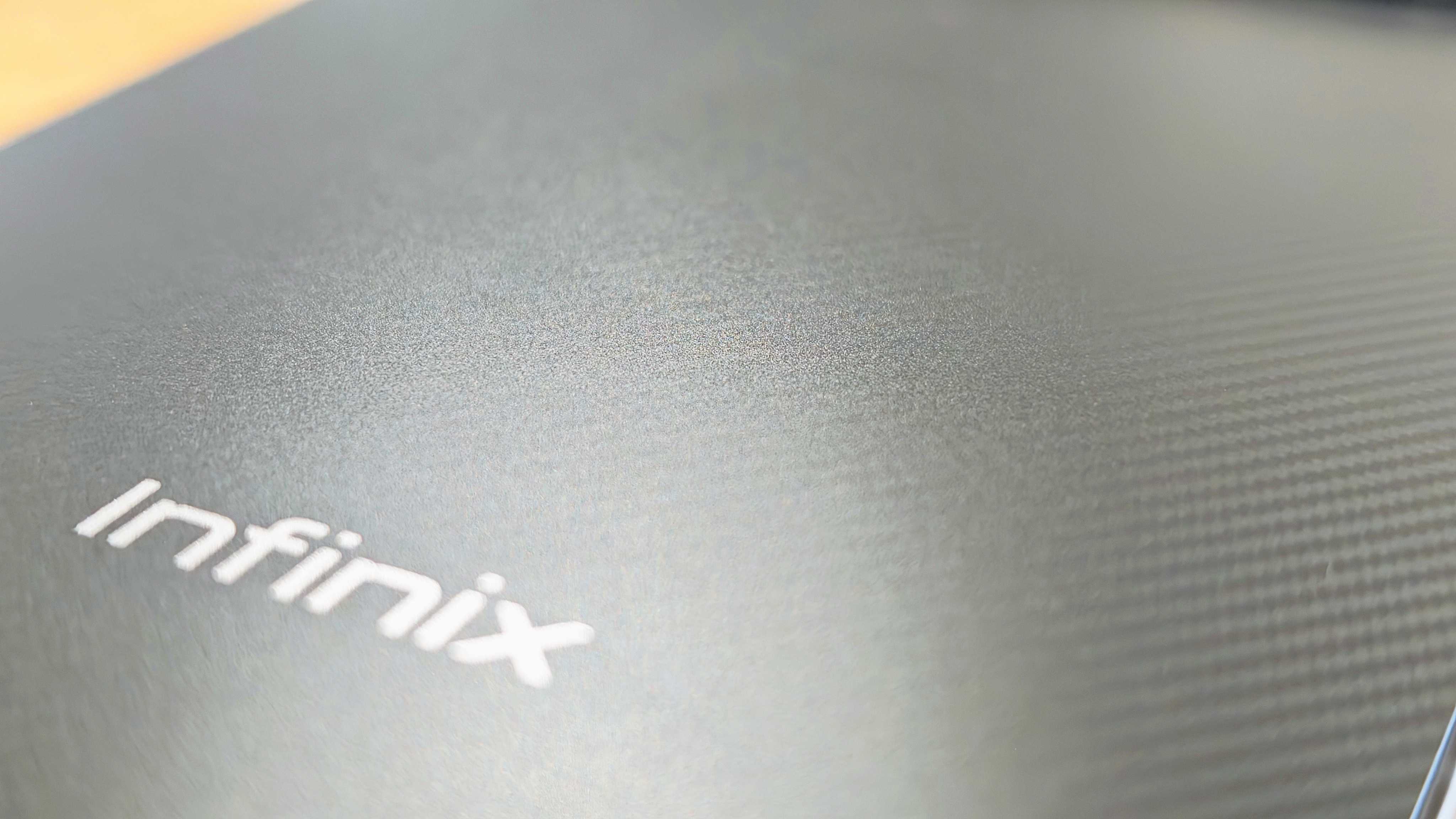 Image of the Infinix Note 60 Ultra sitting on a wooden table