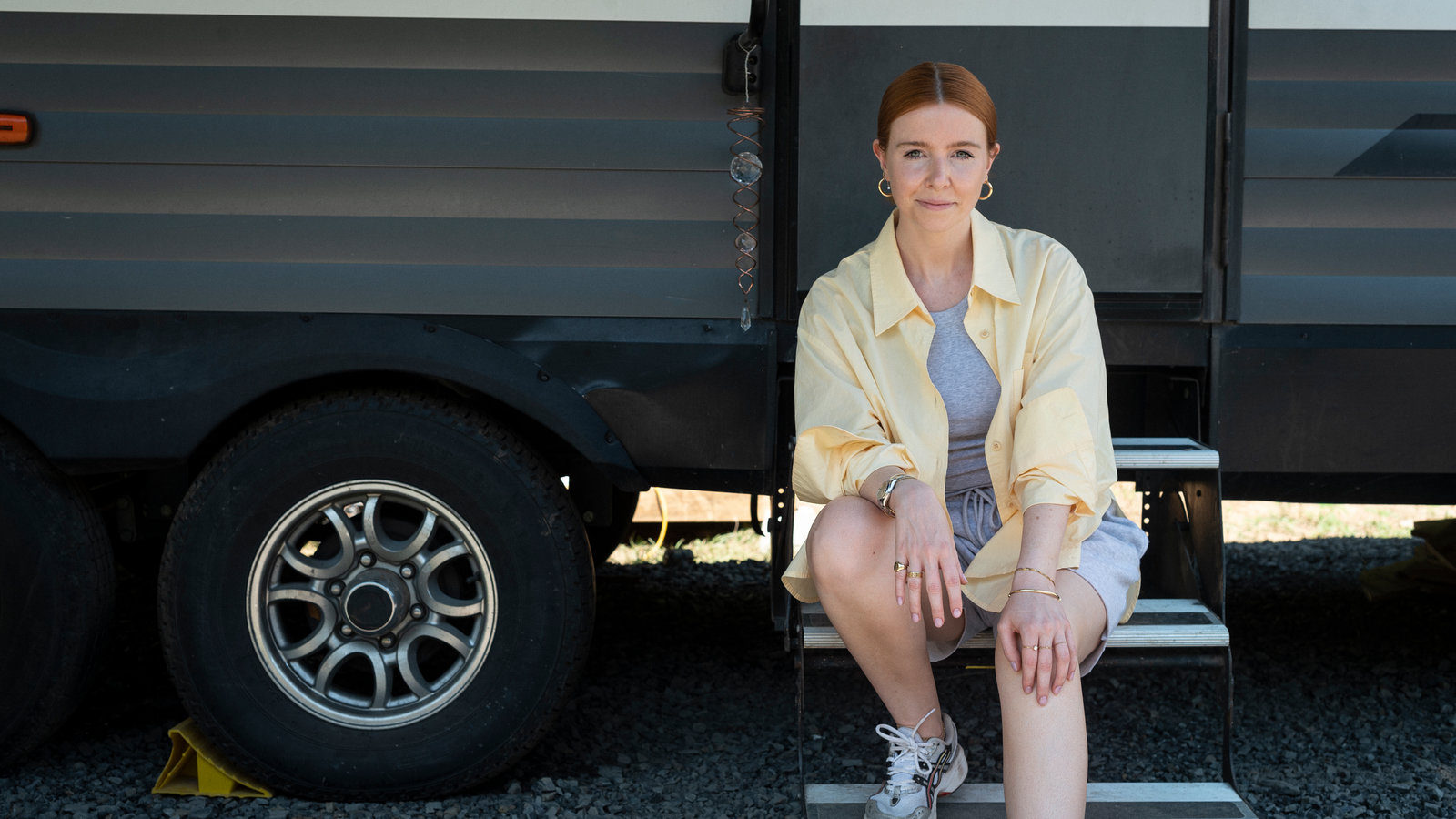 Stacey Dooley outside a motorhome