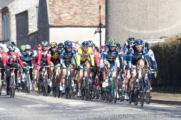 Race leader Thomas De Gendt's Vacansoleil - DCM squad heads the peloton.
