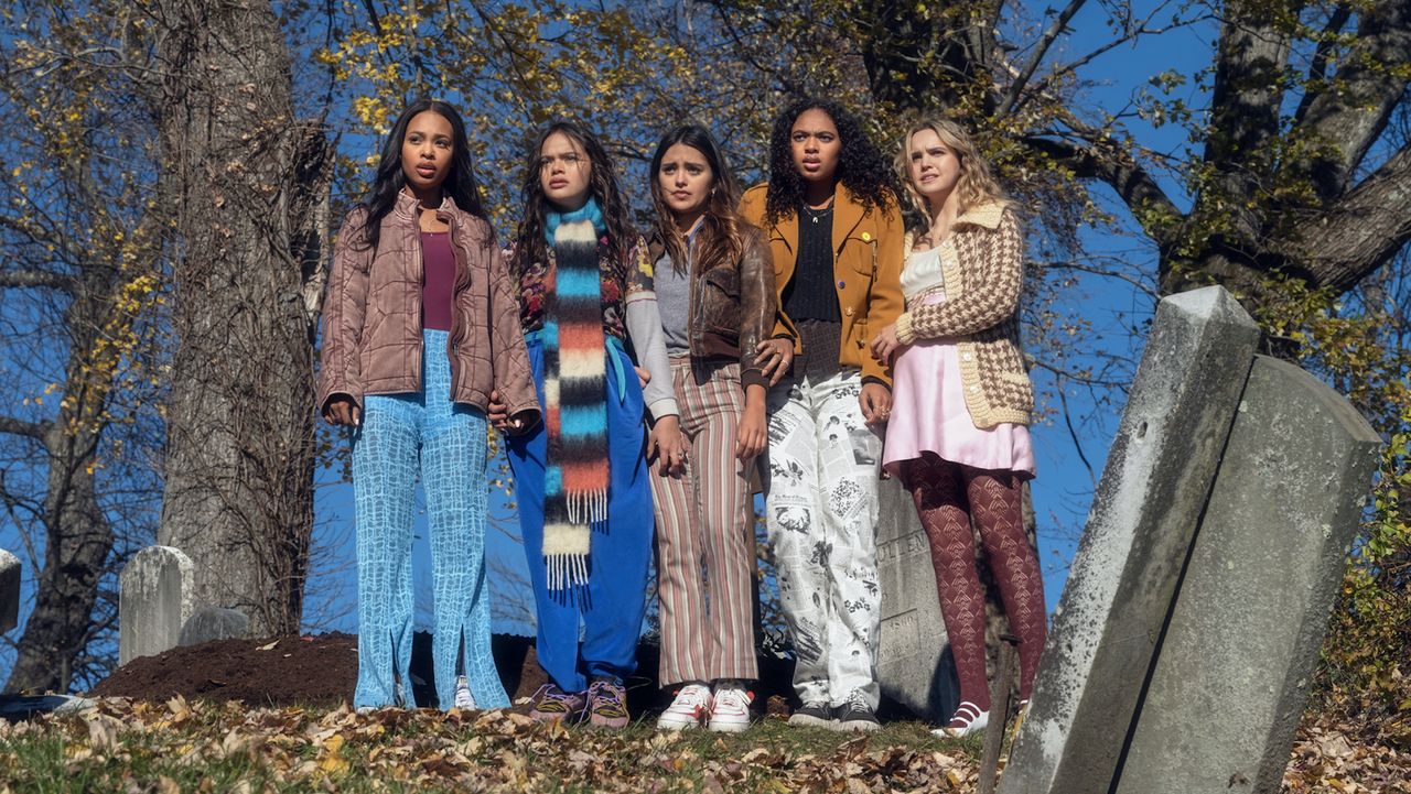 cast of pretty little liars original sin at a scene in front of a grave