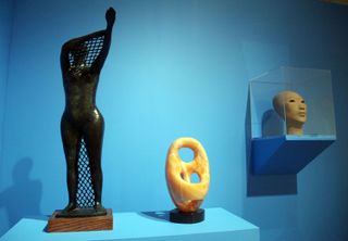 Artwork and sculptures by Elizabeth Catlett on display in a 2011 exhibition