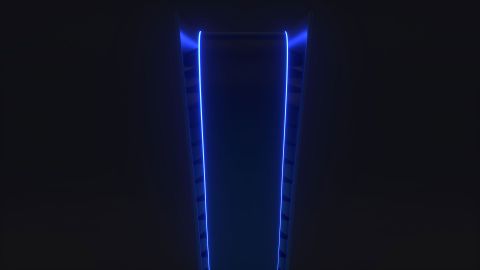 The blue glow of the PS5 in the dark