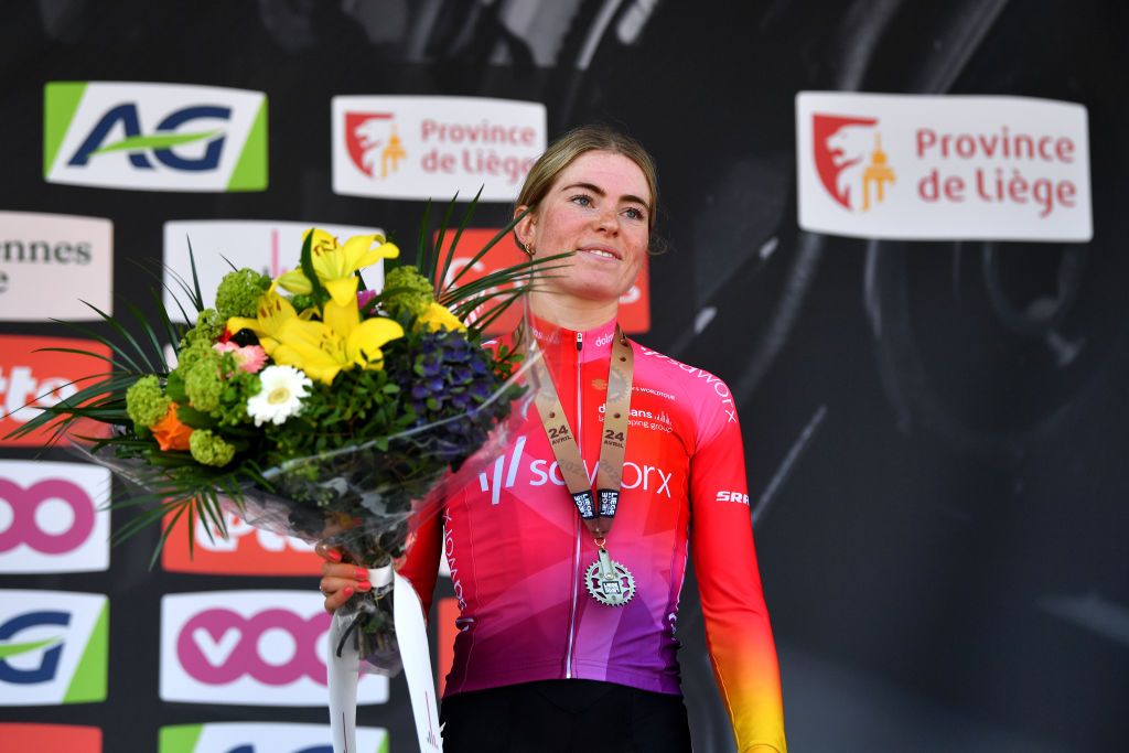 LIEGE BELGIUM APRIL 24 Demi Vollering of Netherlands and Team SD Worx on third place poses on the podium ceremony after the the 6th Liege Bastogne Liege 2022 Femmes a 1421km one day race from Bastogne to Lige LBL LBLwomen UCIWWT on April 24 2022 in Liege Belgium Photo by Luc ClaessenGetty Images
