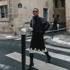 Hannah Lewis wearing a knee high boots look.