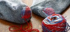 darning socks, repairing holes in socks