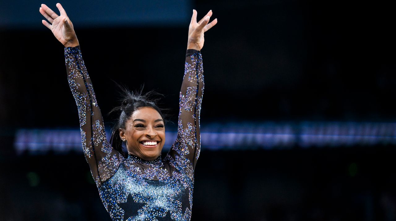 Simone Biles from Team United States reacts after her exercise on the balance beam during day two of the Olympic Games Paris 2024 at the Bercy Arena on July 28, 2024 in Paris, France